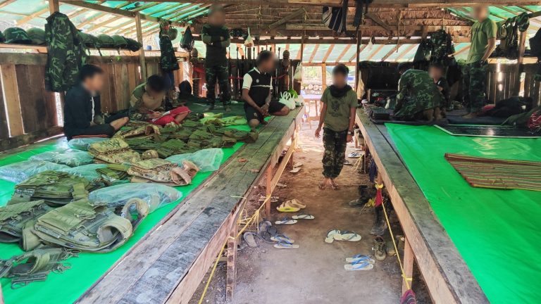 Defectors assigned to frontline roles wait for orders at a camp run by the Karen National Liberation Army in Kayin State in February. (Moe Thaw Dar Swe | Frontier)
